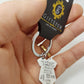 Stainless steel personalised baby grow shaped welcome to the world keyring
